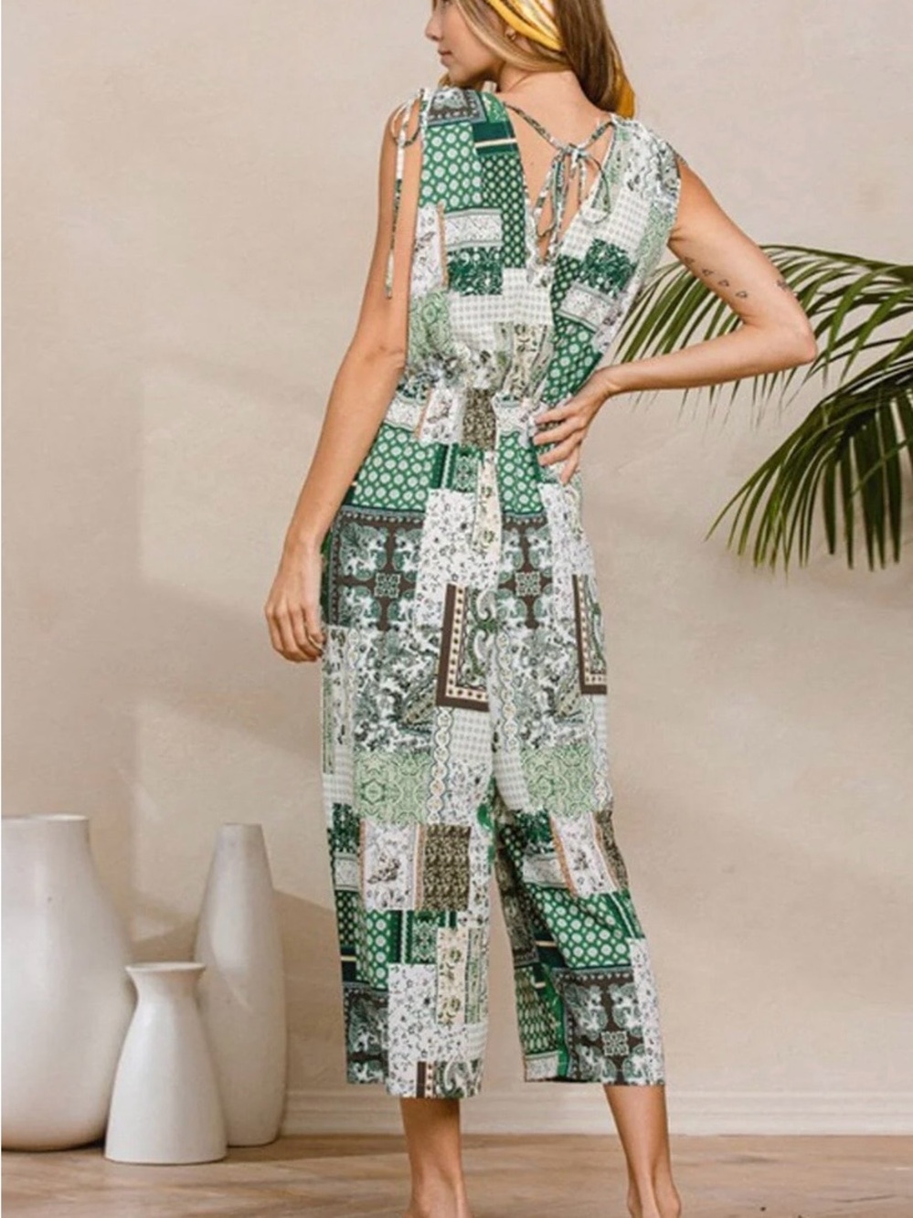 WOMEN'S SLEEVELESS V-NECK SURPLICE
POCKETS MULTI PRINT JUMPSUIT - Picture 2 of 3